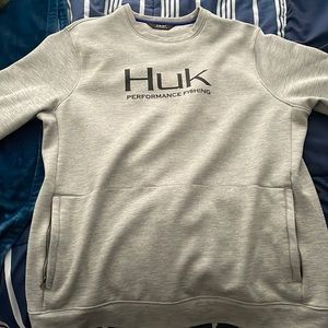 Huk performance fishing crew neck. With zip front pockets !